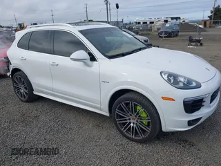 2016 Porsche Cayenne S E-Hybrid with VIN WP1AE2A22GLA17486, listed as a IAAI auction lot 42229641 with 91,642 mi miles and . Bid and sale history available at DreamBid. Image 1.