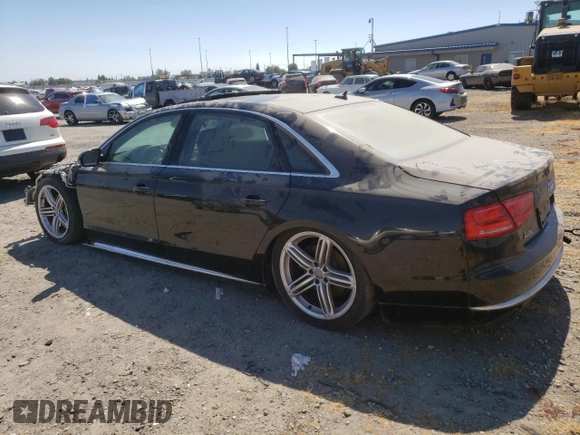 2013 Audi A8 3.0L with VIN WAURGAFD9DN004556, listed as a Copart auction lot 65018975 with 138,090 mi miles and Salvage title. Bid and sale history available at DreamBid. Image 2.
