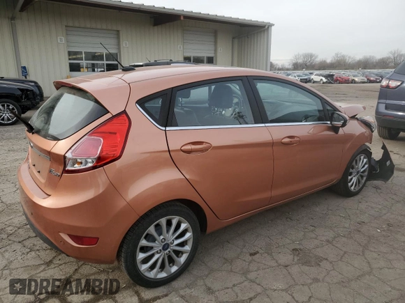2017 Ford Fiesta Titanium with VIN 3FADP4FJ8HM164132, listed as a Copart auction lot 82577424 with 63,686 mi miles and Salvage Title. Bid and sale history available at DreamBid. Image 3.