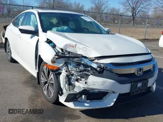 2017 Honda Civic Sedan EX-L with VIN 2HGFC1F70HH651956, listed as a IAAI auction lot 41754511 with 129,385 mi miles. Bid and sale history available at carsss.com. Image 1.