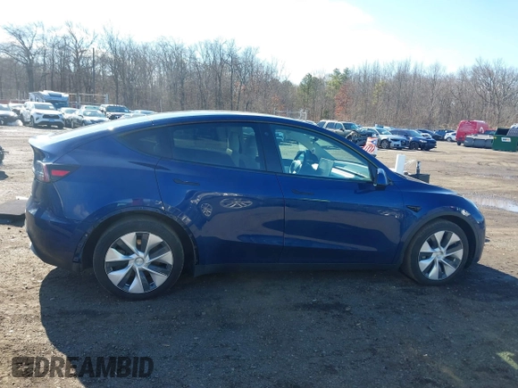 2021 Tesla Model Y Long Range with VIN 5YJYGDEE8MF293230, listed as a IAAI auction lot 41744033 with 56,797 mi miles and . Bid and sale history available at DreamBid. Image 13.