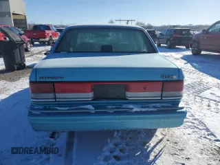 1993 Plymouth Acclaim z VIN 3P3XA46K6PT601129, wystawiony jako Copart lot #45379495 z przebiegiem 81 565 mil mil oraz Szkody całkowita. Historia ofert i sprzedaży dostępna na DreamBid. Obrazek 6.