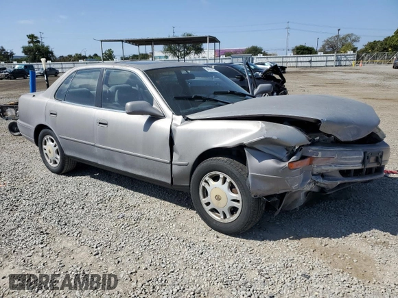 1994 Toyota Camry LE z VIN JT2GK12E6R0055565, wystawiony jako Copart lot #54031255 z przebiegiem 240 841 mil mil oraz Szkoda całkowita • Salvage title. Historia ofert i sprzedaży dostępna na DreamBid. Obrazek 4.