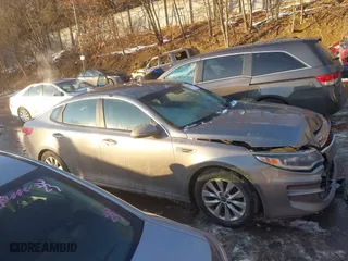 2016 Kia Optima LX with VIN 5XXGT4L39GG014281, listed as a IAAI auction lot 41367750 with 102,683 mi miles. Bid and sale history available at carsss.com. Image 13.