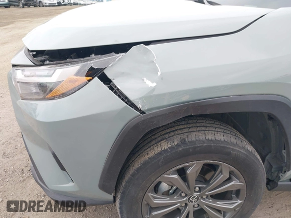 2022 Toyota RAV4 Hybrid XLE Premium with VIN 4T3B6RFV8NU102695, listed as a IAAI auction lot 42385078 with 35,614 mi miles and . Bid and sale history available at DreamBid. Image 6.