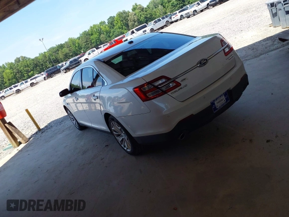 2015 Ford Taurus Limited z VIN 1FAHP2F89FG101017, wystawiony jako IAAI lot #42284459 z przebiegiem 183 167 mil mil oraz . Historia ofert i sprzedaży dostępna na DreamBid. Obrazek 3.