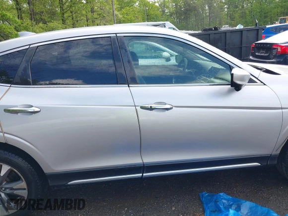 2013 Honda Crosstour EX-L z VIN 5J6TF2H58DL002942, wystawiony jako IAAI lot #42136150 z przebiegiem 42 787 mil mil oraz . Historia ofert i sprzedaży dostępna na DreamBid. Obrazek 13.