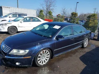 2004 Volkswagen Phaeton V8 z VIN WVWAF63D048009440, wystawiony jako IAAI lot #41495309 z przebiegiem 108 685 mil mil oraz . Historia ofert i sprzedaży dostępna na DreamBid. Obrazek 2.