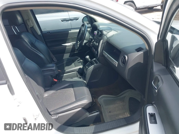 2016 Jeep Compass Latitude with VIN 1C4NJDEB1GD616457, listed as a IAAI auction lot 41962493 with 80,717 mi miles and . Bid and sale history available at DreamBid. Image 5.