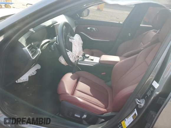 2022 BMW 3 Series M340i xDrive with VIN WBA5U9C02NFL65825, listed as a Copart auction lot 60244064 with 22,548 mi miles and Salvage Title. Bid and sale history available at DreamBid. Image 7.
