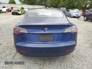 2023 Tesla Model 3 with VIN 5YJ3E1EA7PF450973, listed as a Copart auction lot 61082175 with 47,029 mi miles and Salvage title. Bid and sale history available at DreamBid. Image 6.