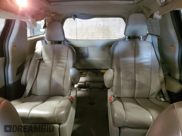 2011 Toyota Sienna XLE with VIN 5TDDK3DC1BS028679, listed as a Copart auction lot 52450655 with 114,054 mi miles and Salvage Title. Bid and sale history available at carsss.com. Image 10.