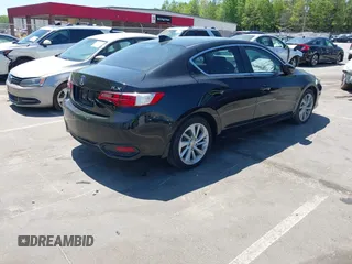 2018 Acura ILX with VIN 19UDE2F30JA003834, listed as a IAAI auction lot 42066312 with 69,719 mi miles and . Bid and sale history available at DreamBid. Image 4.