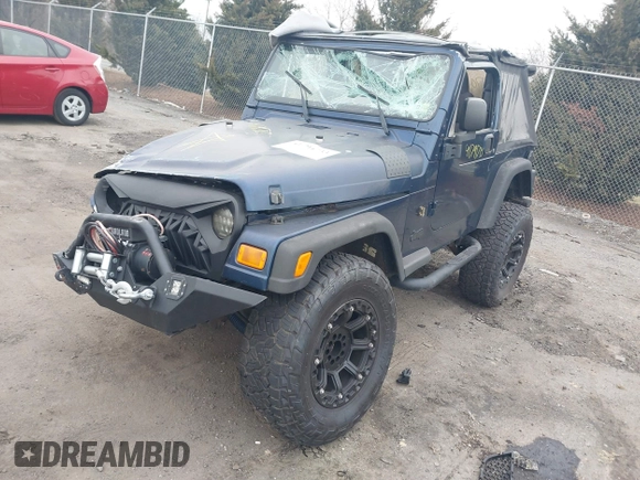 2003 Jeep Wrangler X with VIN 1J4FA39S23P300447, listed as a IAAI auction lot 41791733 with 165,576 mi miles. Bid and sale history available at carsss.com. Image 17.