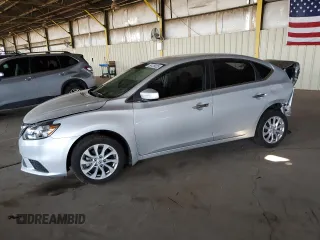2019 Nissan Sentra S z VIN 3N1AB7APXKY293386, wystawiony jako Copart lot #59126025 z przebiegiem 57 462 mil mil oraz Szkoda całkowita • Salvage title. Historia ofert i sprzedaży dostępna na DreamBid. Obrazek 1.