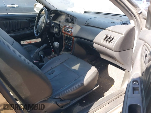 2000 Nissan Altima GXE with VIN 1N4DL01A9YC140466, listed as a IAAI auction lot 41605677 with 127,066 mi miles. Bid and sale history available at carsss.com. Image 5.