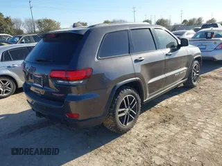 2018 Jeep Grand Cherokee Trailhawk with VIN 1C4RJFLT9JC244212, listed as a IAAI auction lot 41443469 with 77,953 mi miles and . Bid and sale history available at DreamBid. Image 4.