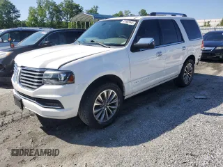 2015 Lincoln Navigator with VIN 5LMJJ2HT2FEJ12640, listed as a Copart auction lot 57882045 with 125,056 mi miles and Salvage title. Bid and sale history available at DreamBid. Image 1.