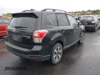 2018 Subaru Forester Premium with VIN JF2SJGEC4JH581718, listed as a IAAI auction lot 41988454 with 76,376 mi miles. Bid and sale history available at carsss.com. Image 4.