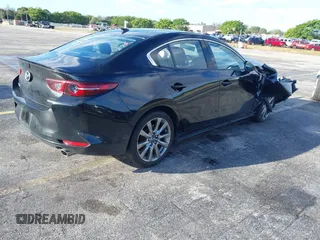 2021 Mazda 3 Premium with VIN JM1BPADL7M1303484, listed as a IAAI auction lot 41666785 with 34,476 mi miles and . Bid and sale history available at DreamBid. Image 4.