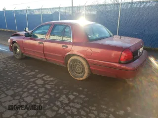 2000 Ford Crown Victoria Police Police Interceptor with VIN 2FAFP71W1YX118742, listed as a Copart auction lot 85001254 with 210,083 mi miles and Salvage Title. Bid and sale history available at carsss.com. Image 2.