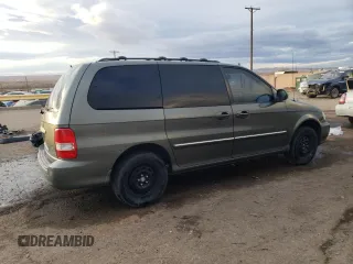 2003 Kia Sedona LX with VIN KNDUP131636359281, listed as a Copart auction lot 81978154 with 180,813 mi miles and Salvage Title. Bid and sale history available at carsss.com. Image 3.