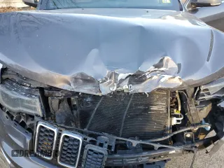 2018 Jeep Grand Cherokee Limited z VIN 1C4RJFBG7JC369651, wystawiony jako Copart lot #81523544 z przebiegiem 159 091 mil mil oraz Szkoda całkowita • Salvage title. Historia ofert i sprzedaży dostępna na DreamBid. Obrazek 12.