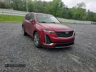 2021 Cadillac XT6 Premium Luxury with VIN 1GYKPDRSXMZ231922, listed as a Copart auction lot 51981065 with 16,784 mi miles and Salvage Title. Bid and sale history available at carsss.com. Image 12.