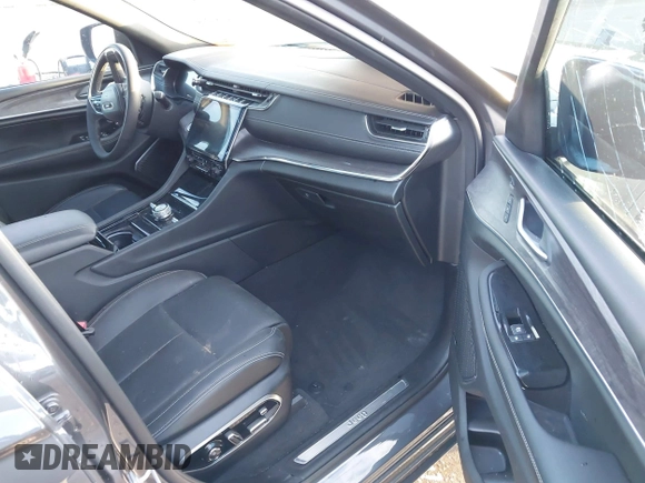 2023 Jeep Grand Cherokee Overland with VIN 1C4RJHDGXP8864365, listed as a IAAI auction lot 40502141 with 3,911 mi miles and . Bid and sale history available at DreamBid. Image 5.