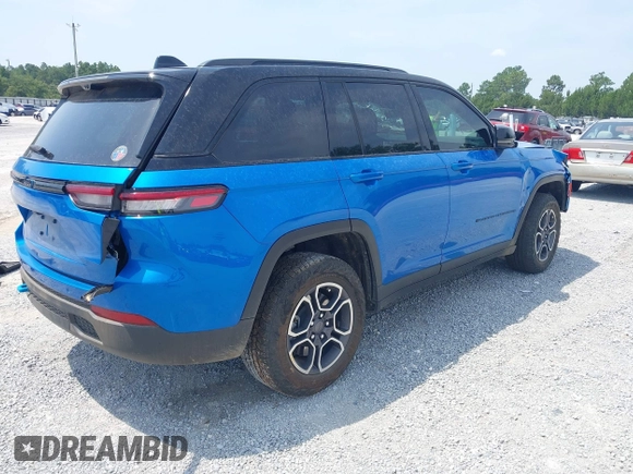 2022 Jeep Grand Cherokee Trailhawk with VIN 1C4RJYC68N8759961, listed as a IAAI auction lot 42589997 with 28,429 mi miles and . Bid and sale history available at DreamBid. Image 4.