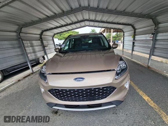 2020 Ford Escape Titanium Hybrid with VIN 1FMCU0DZ5LUB81972, listed as a IAAI auction lot 42679188 with 19,400 mi miles and . Bid and sale history available at DreamBid. Image 4.