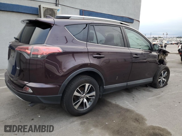 2017 Toyota RAV4 XLE with VIN 2T3WFREV0HW371653, listed as a Copart auction lot 43712935 with 96,694 mi miles and Salvage Title. Bid and sale history available at carsss.com. Image 3.