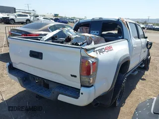 2020 Toyota Tacoma SR5 with VIN 3TMCZ5ANXLM297886, listed as a IAAI auction lot 41965591 with Not provided miles and . Bid and sale history available at DreamBid. Image 4.
