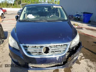 2012 Volkswagen Routan SE z VIN 2C4RVABG1CR276626, wystawiony jako Copart lot #51899455 z przebiegiem 173 628 mil mil oraz Szkoda całkowita • Salvage title. Historia ofert i sprzedaży dostępna na DreamBid. Obrazek 12.