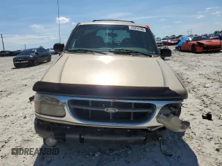 2001 Ford Explorer XLT z VIN 1FMZU63E71ZA48707, wystawiony jako Copart lot #55974105 z przebiegiem 214 188 mil mil oraz Szkody całkowita. Historia ofert i sprzedaży dostępna na DreamBid. Obrazek 5.