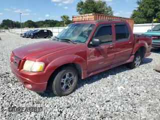 2004 Ford Explorer Sport Trac XLS with VIN 1FMZU77K64UB14512, listed as a Copart auction lot 56985685 with Not provided miles and Salvage title. Bid and sale history available at DreamBid. Image 1.