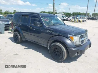 2008 Dodge Nitro SXT with VIN 1D8GU28K98W270780, listed as a IAAI auction lot 41911822 with 277,271 mi miles. Bid and sale history available at carsss.com. Image 1.