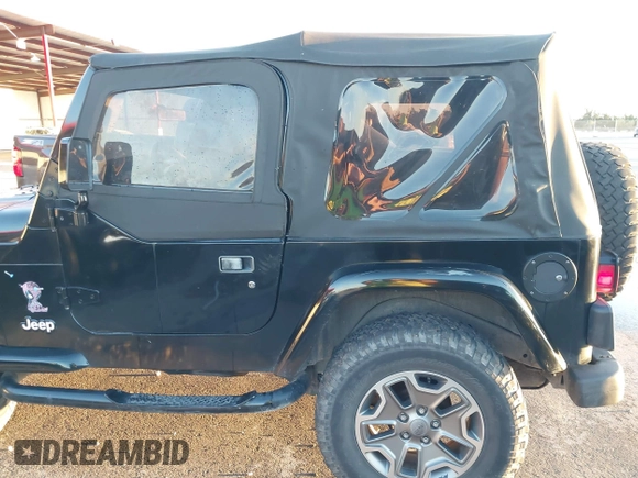 1997 Jeep Wrangler SE with VIN 1J4FY29P0VP415195, listed as a IAAI auction lot 41221078 with 137,046 mi miles. Bid and sale history available at carsss.com. Image 16.