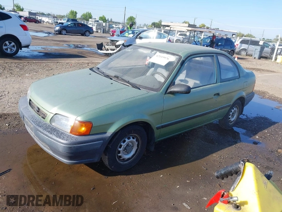 1996 Toyota Tercel DX z VIN JT2AC52L2T0129385, wystawiony jako IAAI lot #42119976 z przebiegiem 100 646 mil mil oraz . Historia ofert i sprzedaży dostępna na DreamBid. Obrazek 2.