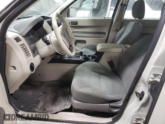2008 Ford Escape XLS с VIN 1FMCU92Z78KB00951, выставлен на аукционе Copart как лот 42512745 с пробегом 148 569 миль миль и Списание • Salvage title. История ставок и продаж доступна на DreamBid. Изображение 7.