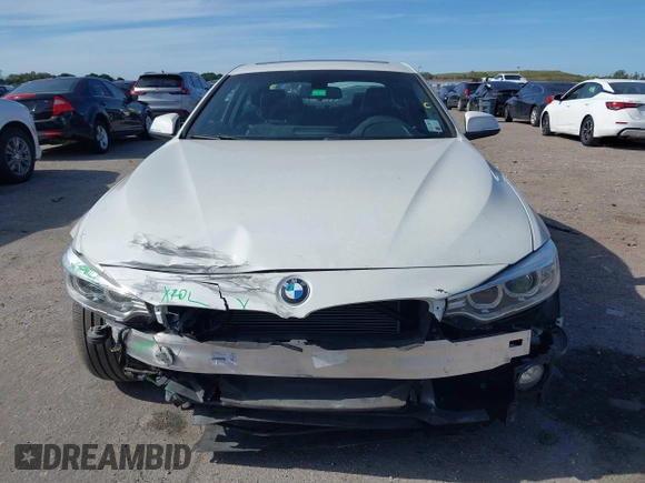 2016 BMW 4 Series 428i with VIN WBA3N7C57GK227468, listed as a IAAI auction lot 41188647 with 81,115 mi miles and . Bid and sale history available at carsss.com. Image 6.