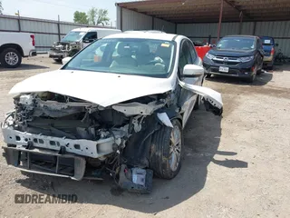 2016 Ford Focus Titanium with VIN 1FADP3N28GL222941, listed as a IAAI auction lot 42050881 with 97,001 mi miles and . Bid and sale history available at DreamBid. Image 17.