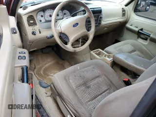 2003 Ford Explorer Sport XLS z VIN 1FMZU70E93UC11352, wystawiony jako Copart lot #84494984 z przebiegiem 188 874 mil mil oraz Szkoda całkowita • Salvage title. Historia ofert i sprzedaży dostępna na DreamBid. Obrazek 8.