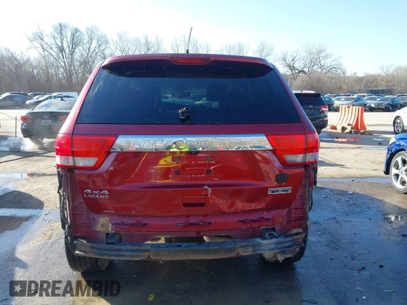 2012 Jeep Grand Cherokee Laredo with VIN 1C4RJFAG3CC163764, listed as a IAAI auction lot 41719137 with 198,827 mi miles. Bid and sale history available at carsss.com. Image 17.