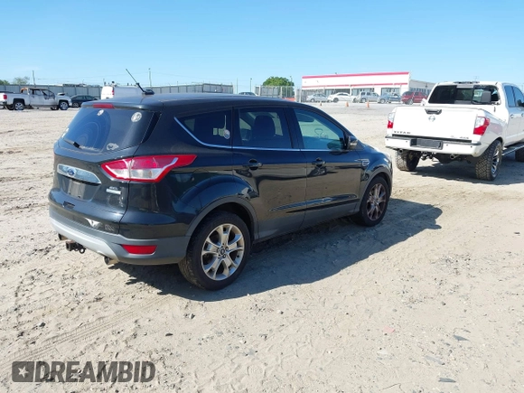 2013 Ford Escape SEL with VIN 1FMCU0HX3DUC67212, listed as a IAAI auction lot 42045568 with 142,382 mi miles. Bid and sale history available at carsss.com. Image 4.