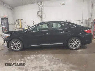 2013 Hyundai Azera z VIN KMHFG4JG4DA218608, wystawiony jako IAAI lot #41601792 z przebiegiem 101 846 mil mil oraz . Historia ofert i sprzedaży dostępna na DreamBid. Obrazek 14.