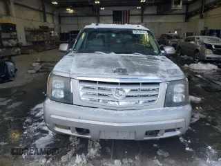 2004 Cadillac Escalade EXT z VIN 3GYEK62N34G324955, wystawiony jako Copart lot #87479764 z przebiegiem 218 127 mil mil oraz Szkody całkowita. Historia ofert i sprzedaży dostępna na DreamBid. Obrazek 5.