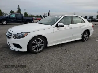 2014 Mercedes-Benz E-Class E 250 BlueTEC Luxury with VIN WDDHF0EB9EA943376, listed as a Copart auction lot 82695654 with 185,193 mi miles and Salvage Title. Bid and sale history available at carsss.com. Image 1.