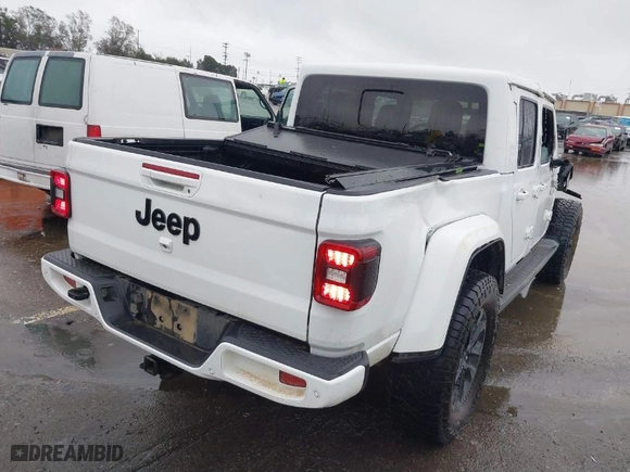 2021 Jeep Gladiator Overland with VIN 1C6HJTFG8ML567025, listed as a IAAI auction lot 41582271 with 53,621 mi miles. Bid and sale history available at carsss.com. Image 4.