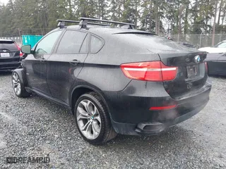 2014 BMW X6 50i with VIN 5UXFG8C57EL593257, listed as a IAAI auction lot 41655486 with 128,292 mi miles. Bid and sale history available at carsss.com. Image 3.